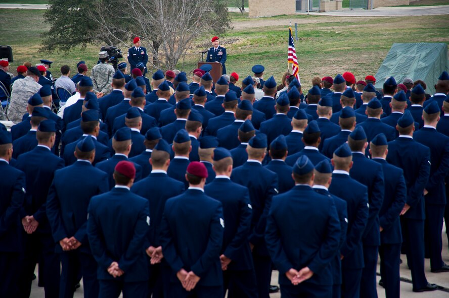 Pararescuemen, combat controllers and Pararescue Indoctrination Course trainees attend the memorial unveiling ceremony honoring Staff Sgt. Scott D. Sather, Jan. 20, 2012, Medina Annex, Lackland Air Force Base, San Antonio, Texas. Sather???s memorial was created and displayed by Civil Engineers in Iraq to honor his leadership and bravery. His memorial was then transported to Lackland AFB, Texas in March 2011. (U.S. Air Force photo by Senior Airman Marleah Miller)