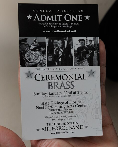 A patron holds a copy of a U.S. Air Force Band Ceremonial Brass ticket from a concert at the Neel Performing Arts Center in Bradenton, Fla., Jan. 22, 2012.  The Ceremonial Brass toured Florida Jan. 11-23 playing their first ever American concert tour.  U.S. Air Force photo by Master Sgt. Adam M. Stump/RELEASED.