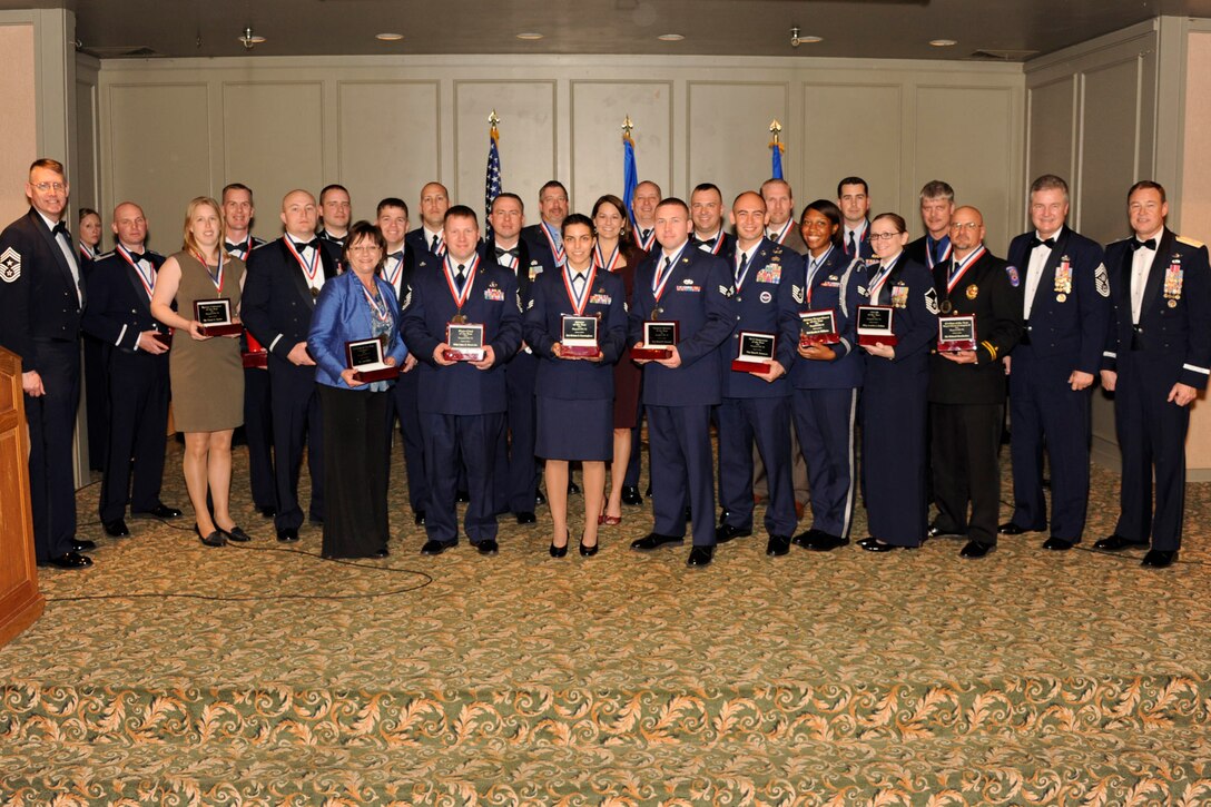 The 82nd Training Wing's 2011 Annual Award winners display their plaques Jan. 20, 2012. The winners were announced during a banquet at the Wichita Falls Country Club with guest speaker, Chief Master Sgt. of the Air Force #14 Gerald Murray. (U.S. Air Force photo/Danny Webb)