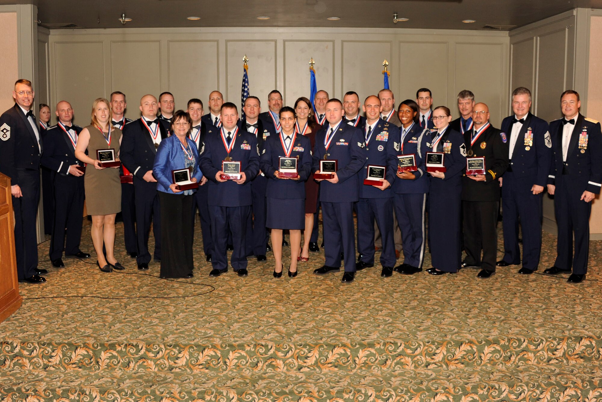 The 82nd Training Wing's 2011 Annual Award winners display their plaques Jan. 20, 2012. The winners were announced during a banquet at the Wichita Falls Country Club with guest speaker, Chief Master Sgt. of the Air Force #14 Gerald Murray. (U.S. Air Force photo/Danny Webb)