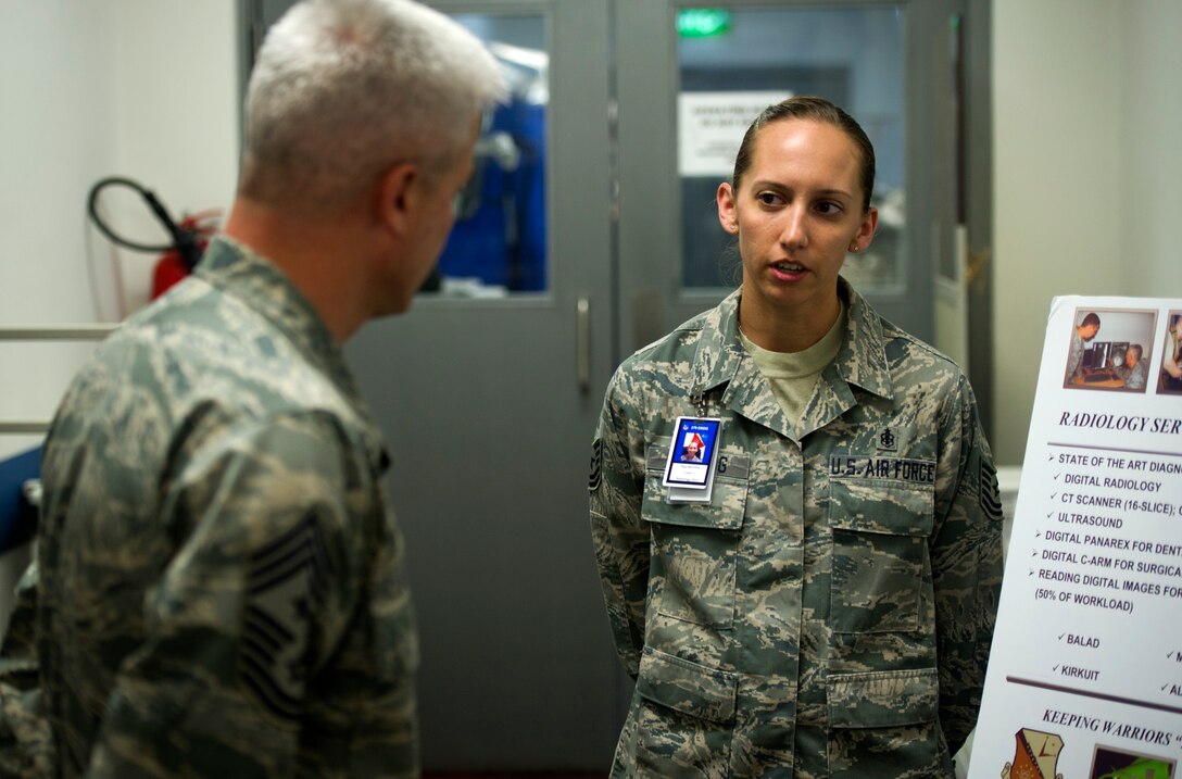 From right, U.S. Air Force Tech. Sgt. Tamra Whiting, 379th Expeditionary Medical Group and native of Richmond, Ind., informs U.S. Air Force Chief Master Sgt. Robert Sealey, U.S. Air Forces Central Command command chief, about the 379th MDG's radiology department at an undisclosed location in Southwest Asia, Jan 18, 2012. Whiting, who's currently deployed from the 28th Medical Group, Joint Base Langley-Eustis, Va., is the NCO in charge of the radiology department here.  During this visit, Sealey was briefed about the Medical Group's abilities and main mission here. Sealey went on to visit several other units through the wing here. (U.S. Air Force photo by Staff Sgt. David Salanitri/Released)