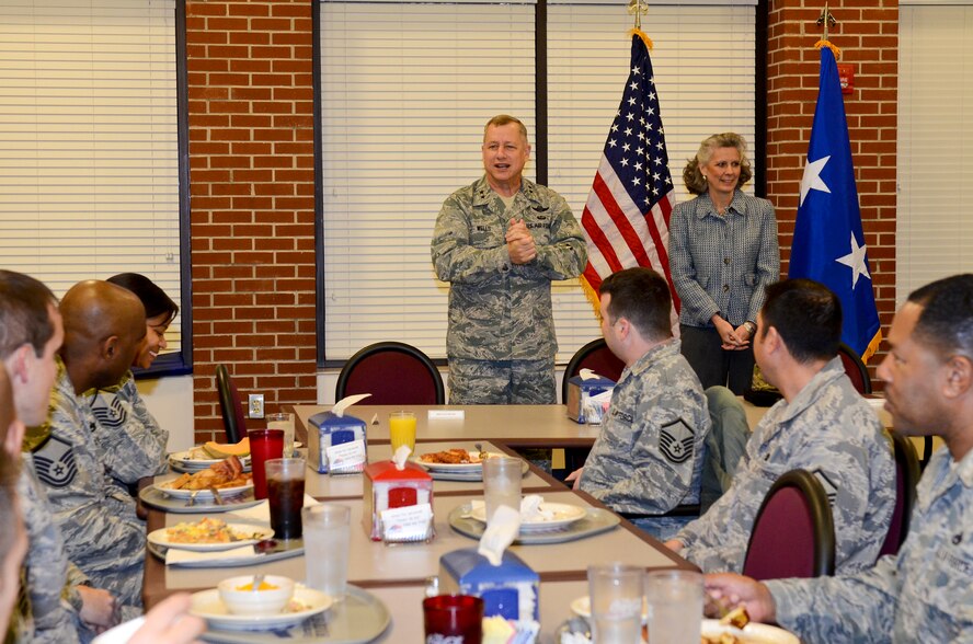 Maj. Gen. Lawrence Wells, 9th Air Force commander, and his wife, Kathy Wells, greet senior noncommissioned officers from the 461st and 116th Air Control Wings (ACW) during breakfast at Wynn Dining Facility, Robins Air Force Base, Ga., Jan. 18, 2012.  The breakfast was a part of a two-day trip to Robins where Wells and his wife visited JSTARS for an orientation of the 461st ACW.  This was Wells' first visit since the activation of the 461st ACW.  (Air National Guard photo by Master Sgt. Roger Parsons/Released)