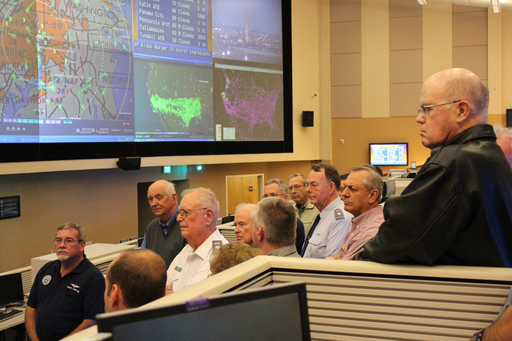 Members of the Civil Air Patrol’s Southeast Region receive a familiarization tour of the Air Force Rescue Coordination Center and the 601st Air and Space Operations Center during their regional conference at Tyndall Air Force Base, Fla., Jan. 20. CAP is a nonprofit, volunteer organization. In its Air Force Auxiliary role, CAP performs 90 percent of continental U.S. inland search and rescue missions as tasked by the AFRCC and was credited with saving 53 lives in 2011. CAP also provides assistance in 1st Air Force’s homeland defense mission. (U.S. Air Force photo by Angela Pope) 