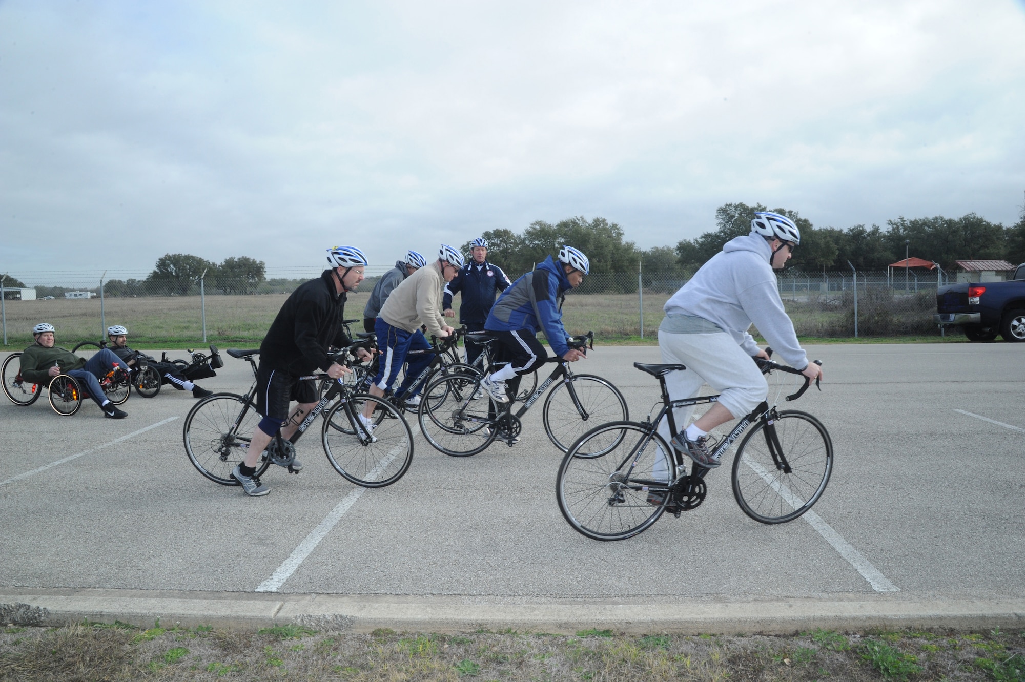 Adaptive Fitness and Sports Camp participants prepare for a bike race at Ebere Park on Joint Base San Antonio-Randolph Jan. 19. Forty five Air Force, Navy and U.S. Special Operations Command Wounded Warriors participated in the inaugural Adaptive Fitness & Sports Camp held at JBSA- Randolph  Jan. 18-21. Events included wheelchair basketball, sitting volleyball, cycling, aquatics, strength and conditioning, adaptive bowling and golf opportunities. (U.S. Air Force photo/Rich McFadden) (released)