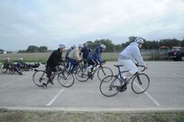 Adaptive Fitness and Sports Camp participants prepare for a bike race at Ebere Park on Joint Base San Antonio-Randolph Jan. 19. Forty five Air Force, Navy and U.S. Special Operations Command Wounded Warriors participated in the inaugural Adaptive Fitness & Sports Camp held at JBSA- Randolph  Jan. 18-21. Events included wheelchair basketball, sitting volleyball, cycling, aquatics, strength and conditioning, adaptive bowling and golf opportunities. (U.S. Air Force photo/Rich McFadden) (released)