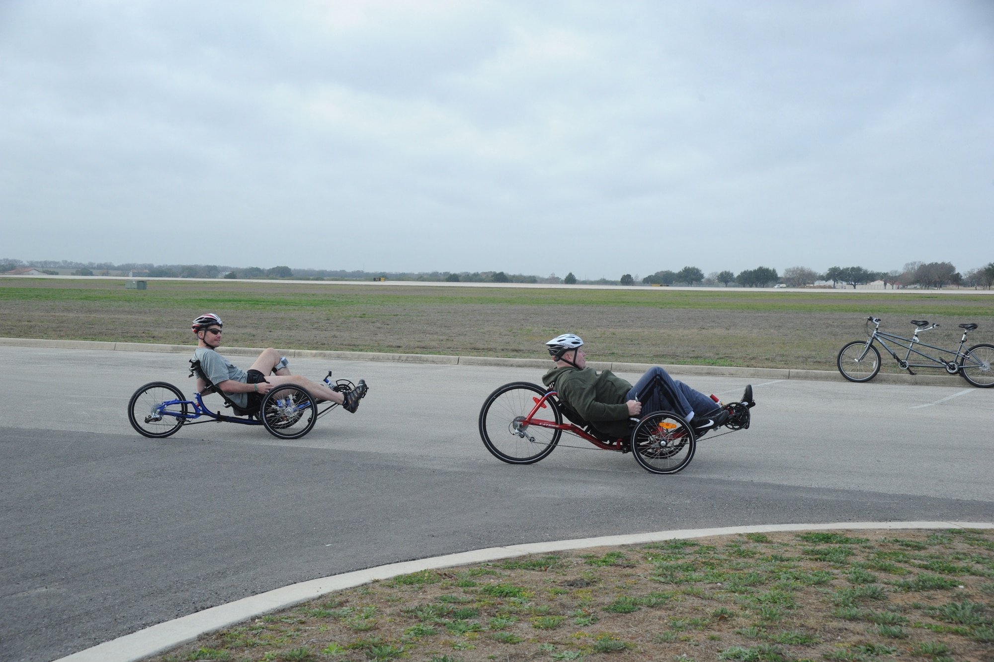 Claude Owens (left) and Tony Simone, Adaptive Fitness and Sports Camp participants practice on recumbant bikes at Eberle Park on Joint Base San Antonio-Randolph Jan. 19. Forty five Air Force, Navy and U.S. Special Operations Command Wounded Warriors participated in the inaugural Adaptive Fitness & Sports Camp held at JBSA- Randolph  Jan. 18-21. Events included wheelchair basketball, sitting volleyball, cycling, aquatics, strength and conditioning, adaptive bowling and golf opportunities. (U.S. Air Force photo/Rich McFadden) (released)