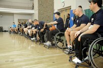 Adaptive Fitness and Sports Camp participants prepare for wheelchair basketball at the gym on Joint Base San Antonio-Randolph Jan. 19. Forty five Air Force, Navy and U.S. Special Operations Command Wounded Warriors participated in the inaugural Adaptive Fitness & Sports Camp held at JBSA- Randolph  Jan. 18-21. Events included wheelchair basketball, sitting volleyball, cycling, aquatics, strength and conditioning, adaptive bowling and golf opportunities. (U.S. Air Force photo/Rich McFadden) (released)