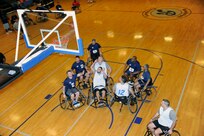 Participants in the Air Force Adaptive Fitness and Sports Camp, play wheelchair basketball at the Rambler Fitness Center, Joint Base San Antonio-Randolph, Texas Jan. 19. (U.S. Air Force photo by Don Lindsey) (released)