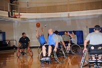 Participants in the Air Force Adaptive Fitness and Sports Camp, play wheelchair basketball at the Rambler Fitness Center, Joint Base San Antonio-Randolph, Texas Jan. 19. (U.S. Air Force photo by Don Lindsey) (released)