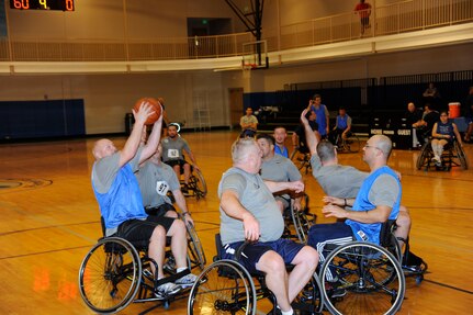 Participants in the Air Force Adaptive Fitness and Sports Camp, play wheelchair basketball at the Rambler Fitness Center, Joint Base San Antonio-Randolph, Texas Jan. 19. (U.S. Air Force photo by Don Lindsey) (released)