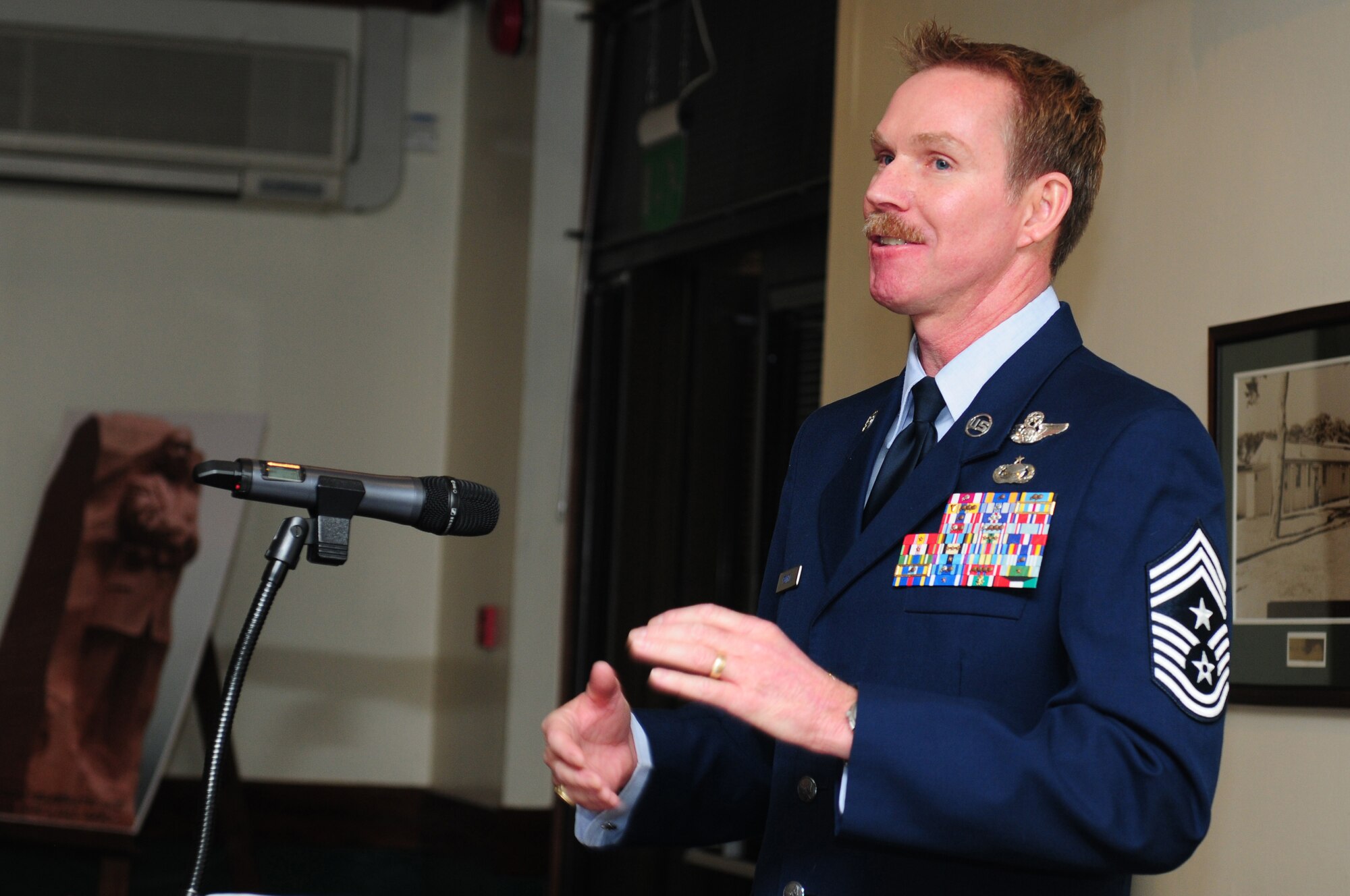 ROYAL AIR FORCE LAKENHEATH, England -- Chief Master Sgt. Christopher Powell, 100th Air Refueling Wing command chief, gives a speech during the Martin Luther King Jr. luncheon, Jan. 20, 2012. Powell was invited by Chief Master Sgt. SaRita Lathan, 48th Fighter Wing command chief, to be the guest speaker at the luncheon. The luncheon also consisted of musical entertainment and a traditional southern buffet to commemorate King's birthday. (U.S. Air Force photo by Senior Airman Lausanne Morgan)