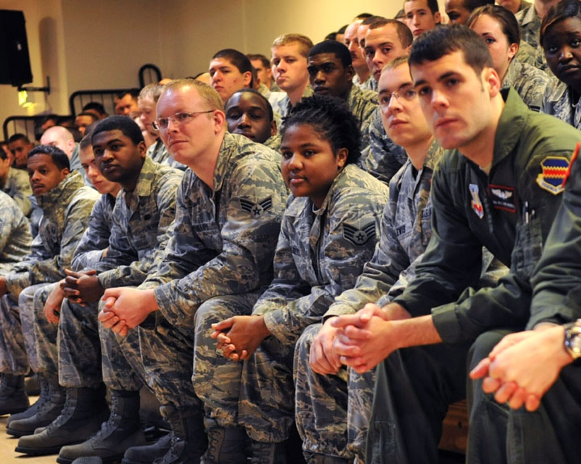 RAF MILDENHALL, England - Team Mildenhall Airmen attend an enlisted call at the Hardstand Fitness Center here Jan. 19, 2012. Gen. Mark A. Welsh III, U.S. Air Forces in Europe commander, and Chief Master Sgt. David Williamson, USAFE command chief, spoke about budget changes and challenges USAFE will see in 2012. (U.S. Air force photo/Senior Airman Jerilyn Quintanilla)
