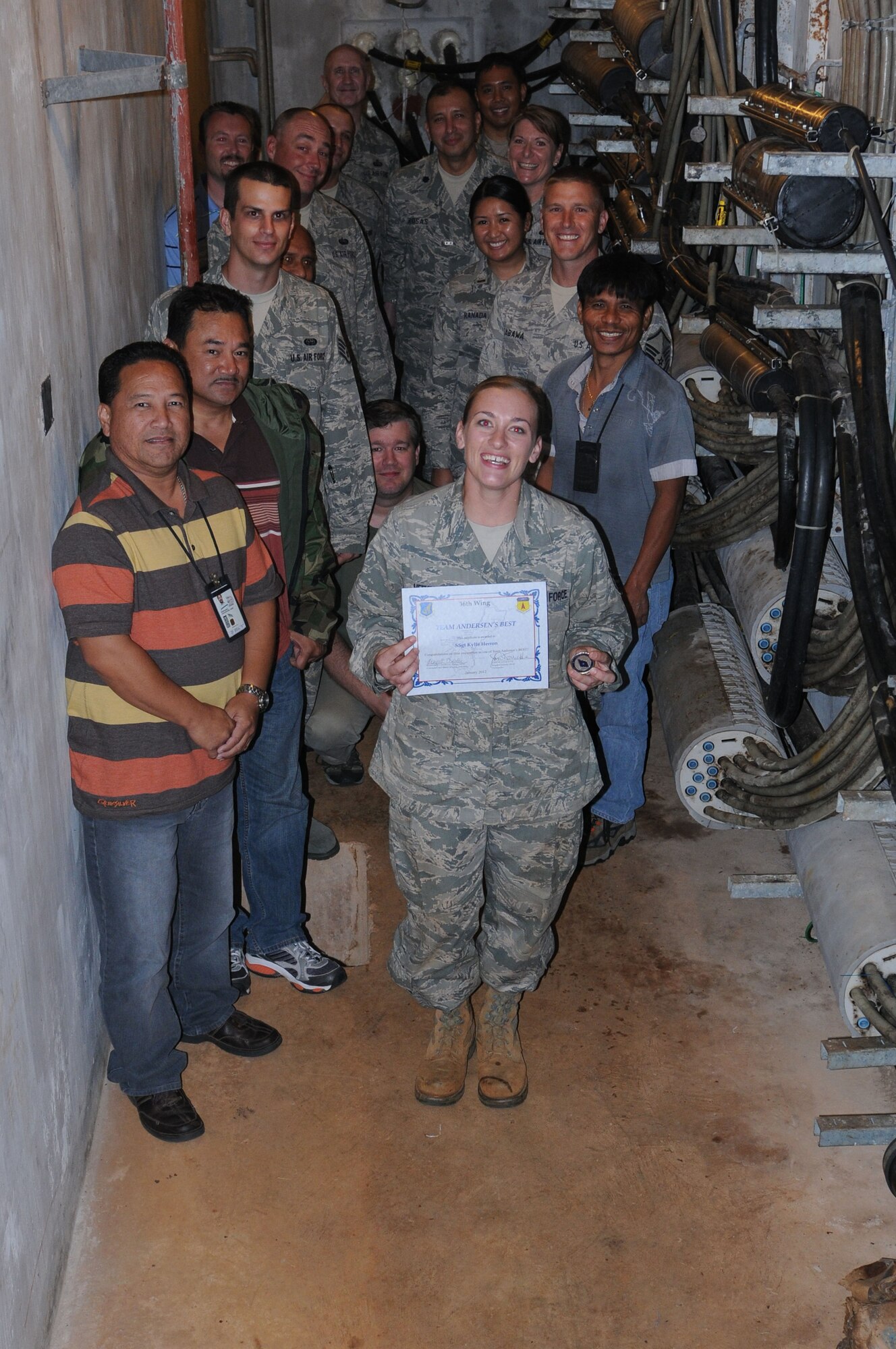 ANDERSEN AIR FORCE BASE, Guam—Staff Sgt. Kylie Herron, 36th Communications Squadron, cable antennamaintenance technician was awarded Team Andersen's Best here, Jan. 12.  Andersen’s Best is a recognition program which highlights a top performer from the 36th Wing. Each week, supervisors nominate a member of their team for outstanding performance and the wing commander presents the selected Airman/Civilian with an award. (U.S. Air Force photo by Senior Airman Carlin Leslie/Released)
