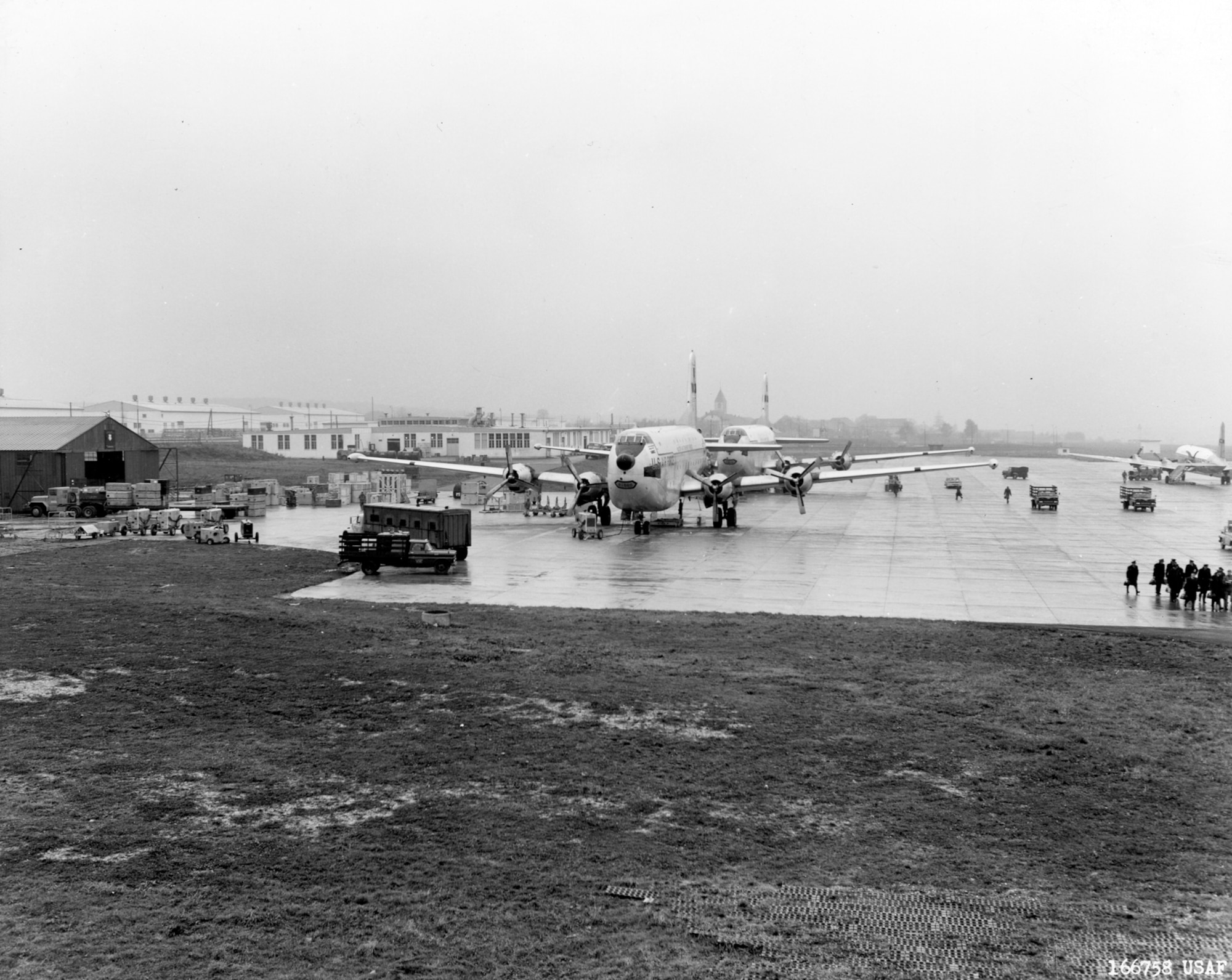 Douglas C-124s unload their cargo at Phalsbourg Air Base, France, as part of Operation Stair Step. Federalized Air National Guard units, equipped with F/RF-84Fs and F-86Hs, moved into five airfields in northeastern France where they bolstered NATO forces from November 1961 to August 1962 before returning home. (U.S. Air Force photo)