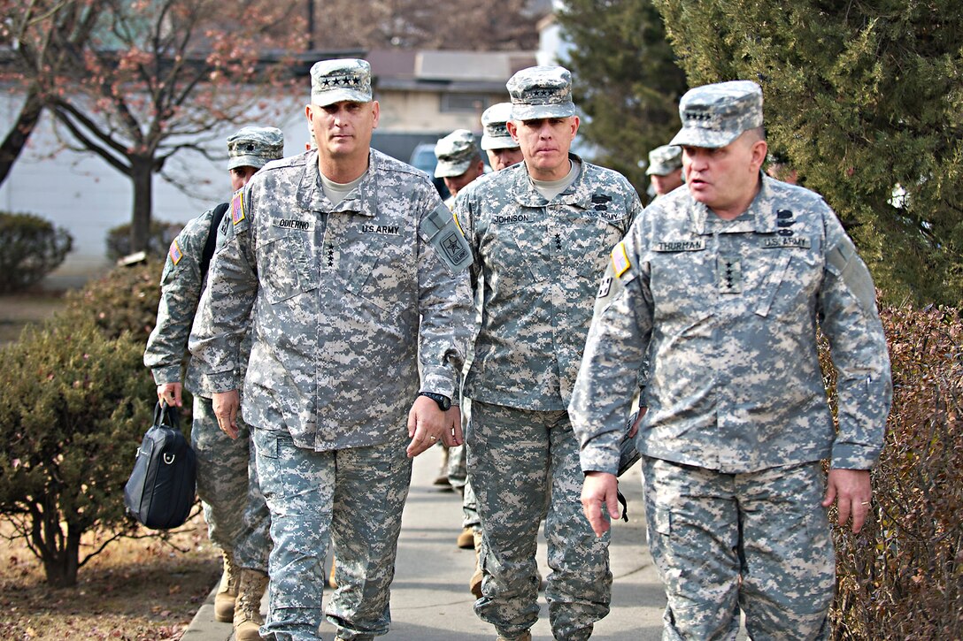 U.S. Army Chief of Staff Gen. Raymond T. Odierno, left, tours Army Garrison Yongsan, South Korea, with U.S. Army Gen. James D. Thurman, right, and Lt. Gen. John D. Johnson, center, Seoul, South Korea Jan. 20, 2012. Johnson is commanding general of the U.S. 8th Army. 