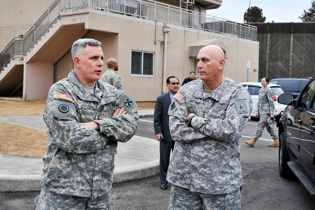 U.S. Army Lt. Gen. John D. Johnson, left, talks to U.S. Army Chief of Staff Gen. Raymond T. Odierno before his departure from Army Garrison Yongsan, Seoul, South Korea Jan. 20, 2012. Johnson is commanding general of the U.S. 8th Army. 
