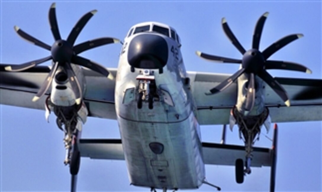 A C-2A Greyhound aircraft prepares to land on the flight deck of the aircraft carrier USS Carl Vinson (CVN 70) in the Arabian Sea on Jan. 12, 2012.  