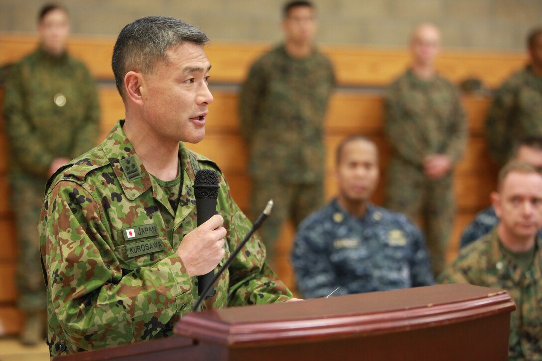 Colonel Akira Kurosawa, commanding officer, Western Army Infantry Unit, Japanese Ground Self Defense Force, speaks during the opening ceremony of Exercise Iron Fist 2012, aboard Cmp Pendleton, Calif., Jan. 23. The opening ceremony begins the bi-lateral training exercise between the 15th Marine Expeditionary Unit and JGSDF. (U.S. Marine Corps photo by Lance Cpl. Timothy Childers)