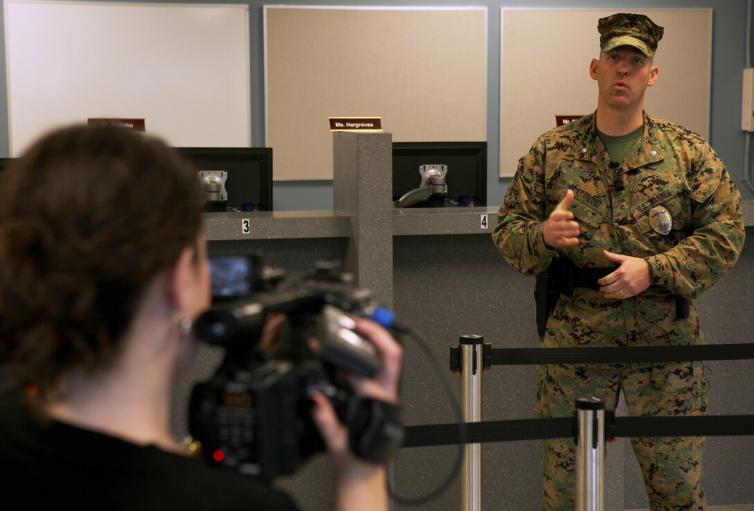 Lt. Col. Robert Stanford, the base provost marshal, speaks with local media and other base officials about the new visitor center’s amenities during the ribbon cutting celebration of the Marine Corps Base Camp Lejeune Main Gate Access Control Complex, Jan. 24.