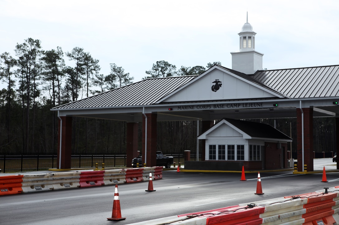 The new Marine Corps Base Camp Lejeune Main Gate Access Control Complex features a gate entrance with a canopy over incoming and outgoing traffic, and as well as a host of security improvements. While the construction of the new gate will do little to decrease the amount of traffic on NC-24, Lt. Col. Robert Stanford, the base provost marshal, said the increased stand-off distance will prevent more cars from cueing on NC-24, especially during non-peak hours.