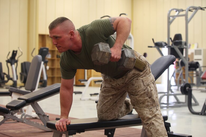 Sgt. Eric Goulet, legal chief, RCT- 6, from Plymouth, N.H. completing his daily workout. Most Marines work out five days a week to stay in shape. Even when deployed physical training is a huge part of being a Marine, they pride themselves on endurance, strength and toughness. Whether carrying 70 pounds of gear on the march or completing a 10-mile conditioning run, Marines give everything they have into staying in shape.