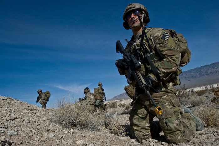 A U.S. Air Force pararescueman, 58th Rescue Squadron, provides security during a combat training mission Jan. 18, 2012, at the Nevada Test and Training Range.  Pararescuemen are trained to provide emergency medical treatment in adverse terrain and conditions in combat or peacetime. (U.S. Air Force photo by Airman 1st Class Daniel Hughes/Released)



