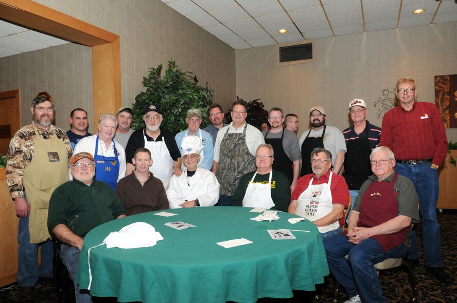 MINOT AIR FORCE BASE, N.D. -- Members of the Military Affairs Committee here joined Airmen and their families for the 47th Annual Team Minot Sportsmen Feed at the Jimmy Doolittle Center Jan. 22. To show their support for Team Minot Airmen and their families, the volunteers spent hours preparing exquisite wild-game appetizers and dishes for the attendees. Guests had the opportunity to play Bingo, enjoy the NFL playoff games, and even win raffle prizes, with a big screen TV as the grand prize. (U.S. Air Force photo/Senior Airman Jesse Lopez)

