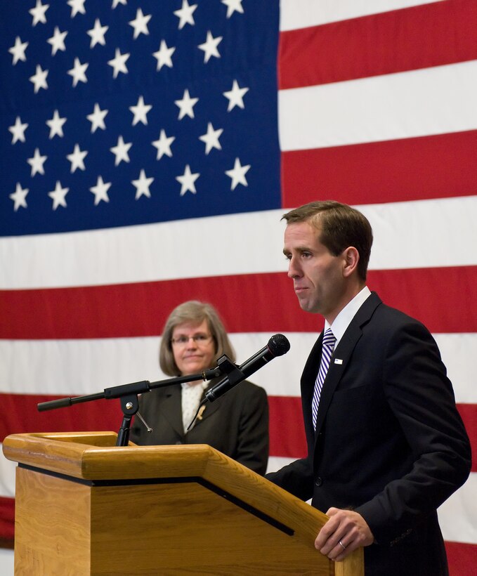 Joseph R. "Beau" Biden, the attorney general for Delaware, speaks to the press Jan. 20 at Dover Air Force Base, Del., in regards to financial consumer issues military members face, including mortgage, interest and internet scams. He and Holly Petraeus, the director of the Consumer Financial Protection Bureau's Office of Servicemember Affairs, also met with base leadership and held a town hall meeting with service members during their visit to Team Dover. (U.S. Air Force photo/Roland Balik)