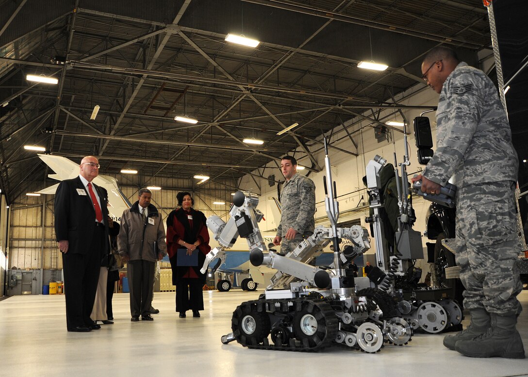 Joint Base Andrews Explosive Ordnance Disposal Airmen display the technical capabilities of the FF-6 and HD-2 robots during a tour for honorary commanders Jan. 20. The honorary commanders were given a tour of the base, which was designed to highlight Andrews assets and its missions to civic leaders and to form positive relationships with the local community. (U.S. Air Force photo/Staff Sgt. Matt Coleman-Foster)