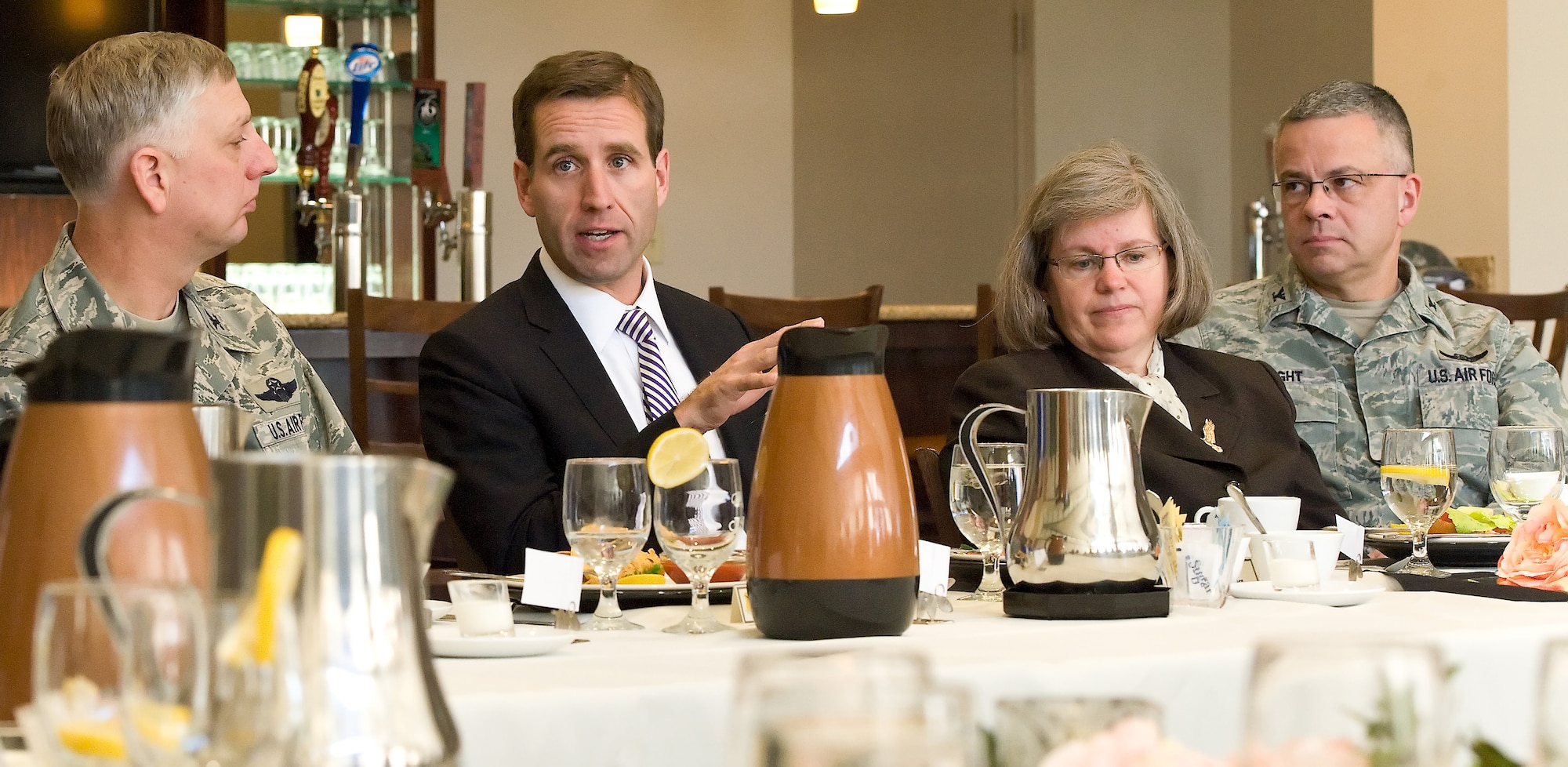 Col. Mark Camerer, left, commander of the 436th Airlift wing, Delaware Attorney General Beau Biden, Holly Petraeus, director of the Consumer Financial Protection Bureau’s Office of Servicemember Affairs, and Col. Randal Bright, commander of the 512th Airlift Wing, discuss consumer financial issues that service members face during a round table discussion Jan. 20, 2012, at The Eagle Creek Golf Course at Dover Air Force Base, Del.  They also met with local media during a press conference and hosted a town hall meeting with Airmen from Dover AFB to discuss issues including housing, for-profit schools, used car lots, loans, debt collection and the Servicemembers Civil Relief Act. (U.S. Air Force photo by Roland Balik)