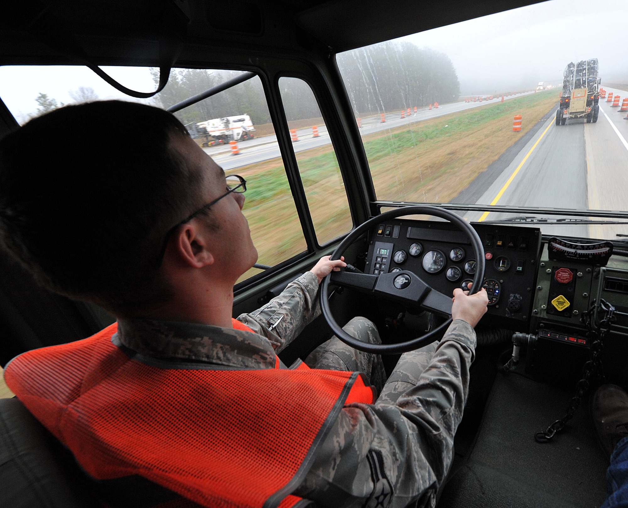 SAVANNAH AIR NATIONAL GUARD BASE, Ga. — Airman 1st Class Bryan Dover, 52nd Combat Communications Squadron cyber transmission systems journeyman, drives a light medium tactical vehicle as part of the second chalk convoy to Savannah, Ga., Jan. 23. The unit began its “Arctic Gator” field training exercise Jan. 24 and will build, operate in and defend a fully functioning bare base communications camp before the exercise ends Feb. 3. (U.S. Air Force photo by Tommie Horton)