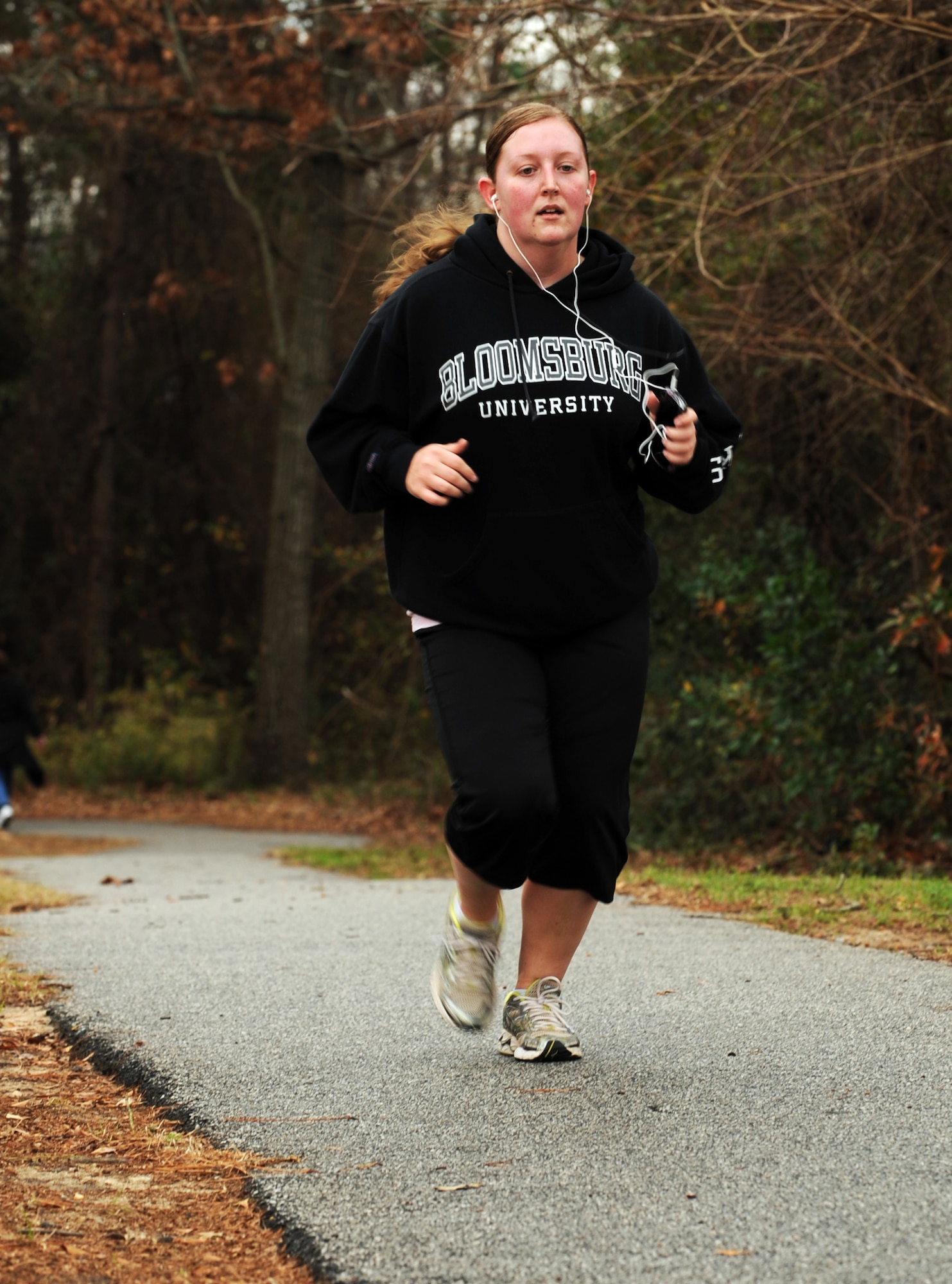 U.S. Air Force Staff Sgt. Sara Howard, 20th Comptroller Squadron accounting liaison technician, runs during the Biggest Loser Competition at the chapel track, Shaw Air Force Base, S.C., Jan. 20, 2012. The Biggest Loser Challenge is a six week program for Team Shaw contestants to work on health, wellness, fitness and nutrition. (U.S. Air Force photo by Airman 1st Class Tabatha McCarthy/Released)