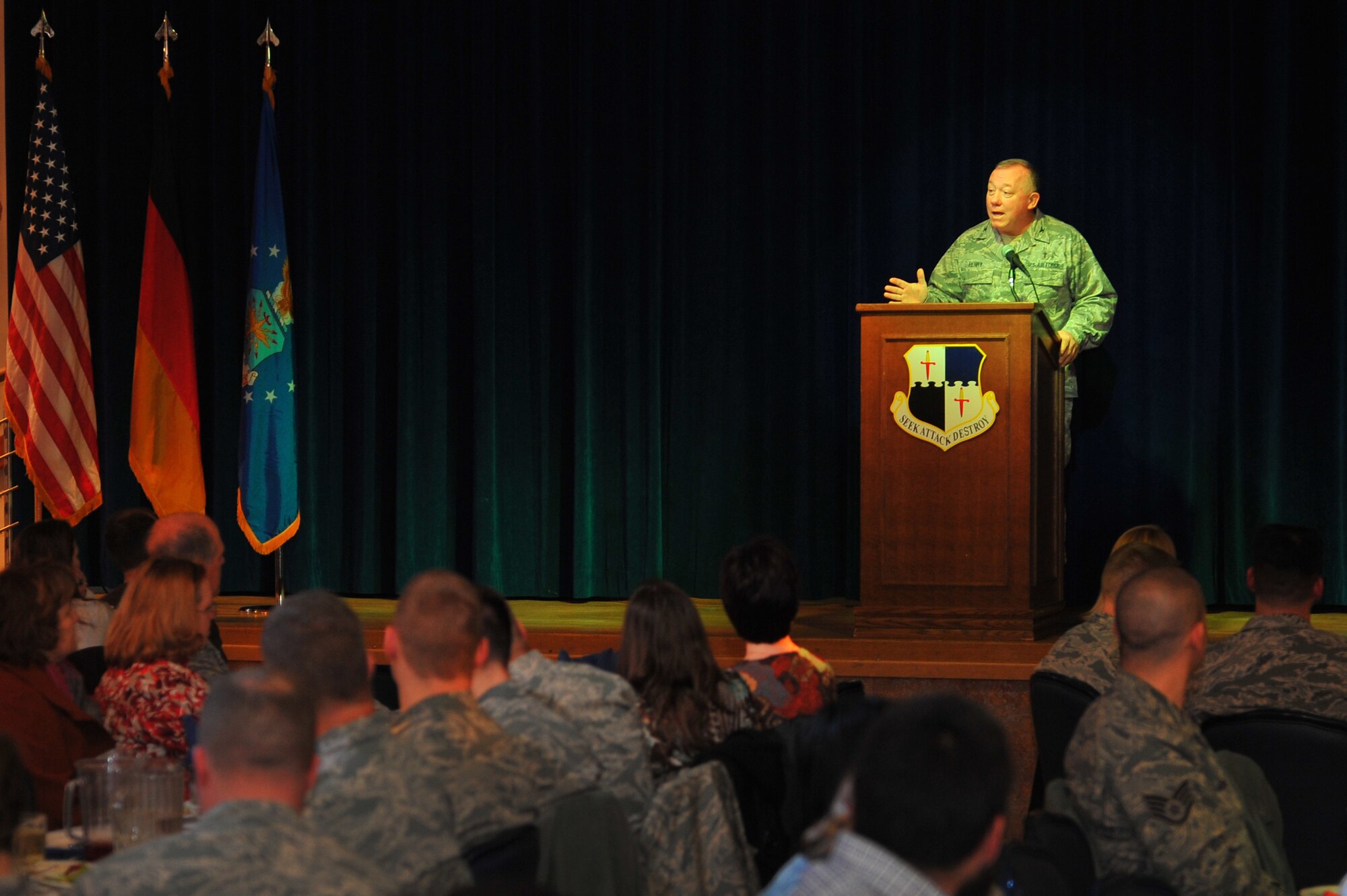 SPANGDAHLEM AIR BASE, Germany – Chaplain (Col.) G. Scott Henry, U.S. Air Forces in Europe command chaplain, speaks during the National Prayer Luncheon inside the Brick House here Jan. 20 about life’s moral and spiritual values  and “taming the terrible twos” in relationships. The National Prayer Breakfast began in 1953 as a way to recognize the values upon which America was founded. The current ceremony highlights these values and promotes a shared sense of spiritual empowerment within communities. (U.S. Air Force photo/Airman 1st Class Dillon Davis)