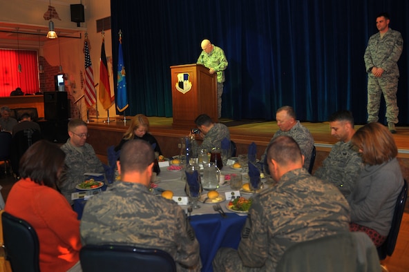 SPANGDAHLEM AIR BASE, Germany – Chaplain (Capt.) Paul Joyner, 52nd Fighter Wing chaplain, delivers an invocation during the National Prayer Luncheon inside the Brick House here Jan. 20. The National Prayer Breakfast began in 1953 as a way to recognize the values upon which America was founded. The current ceremony highlights these values and promotes a shared sense of spiritual empowerment within communities. (U.S. Air Force photo/Airman 1st Class Dillon Davis)