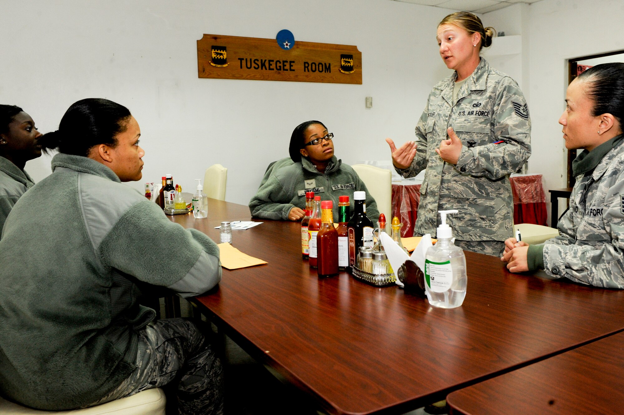 Tech. Sgt. Esther Werstler, 332nd Expeditionary Security Forces Squadron, briefs possible donors on what to expect from a bone marrow transplant procedure during a bone marrow donor registry drive at an undisclosed location in Southwest Asia, Jan. 22, 2012. Werstler, who is a recovering cancer patient, shared her personal story with potential donors. Werstler is deployed from Mountain Home Air Force Base, Idaho, and is a native of Warsaw, Ind. (U.S. Air Force photo by Staff Sgt. Joshua J. Garcia/Released)  