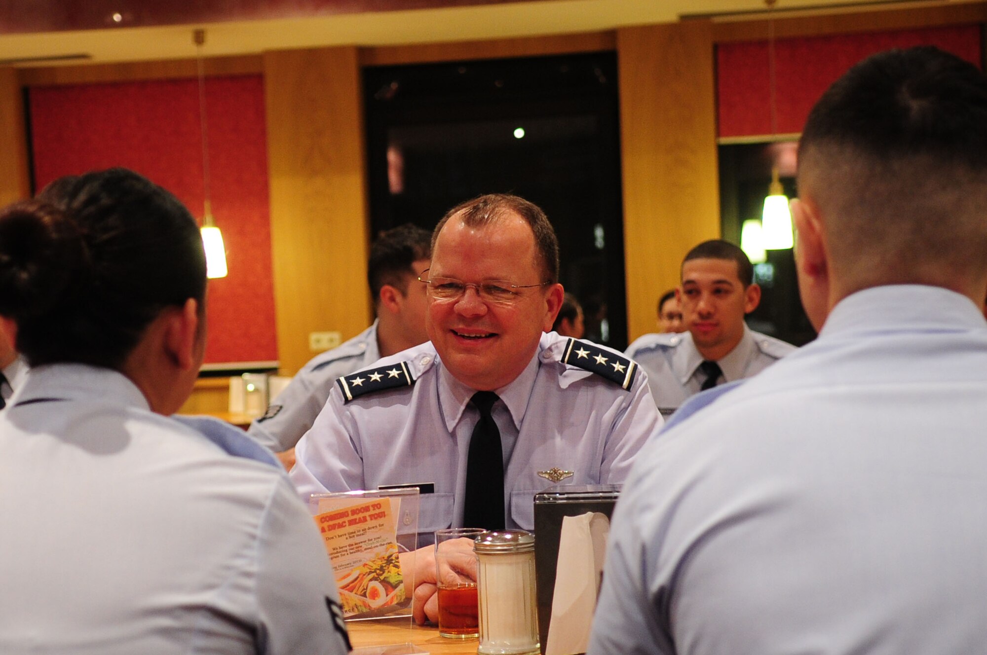 Lt. Gen. Charles B. Green, Air Force surgeon general, speaks with Airmen from the 86th Medical Group during his visit, Ramstein Air Base, Germany, Jan. 23, 2012. The purpose of his visit was to assess the capabilities of the 86th Medical Group and to visit with Airmen from the unit. (U.S. Air Force photo by Senior Airman Brittany Perry)