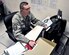 Master Sgt. Christopher Koopmans, 386th Expeditionary Logistic Readiness Squadron’s Air Terminal Operation Center senior controller, keeps his eyes open for any issues that might affect flightline operations for the 386th Air Expeditionary Wing Dec. 30, 2011.  Koopmans, a reservist based at Carswell Air Force Base, Texas, has been steadily working toward his goal of following God and ministering to a congregation as an Air Force chaplain.  In his civilian life, he is a full-time student at Southwestern Baptist Theological Seminary in Fort Worth, Texas, and is 69 hours into a 97-hour program toward the completion of a Master's of Divinity degree. (U.S. Air Force photo/Tech Sgt. Stacy Fowler)