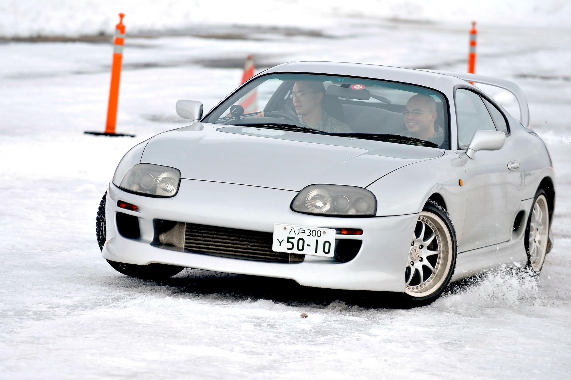 MISAWA AIR BASE, Japan – Airman 1st Class Richard Li, 35th Contracting Squadron contracting specialist, maneuvers through the Slippery Weasel stop-and-steer track here, Jan. 20. The track gave students a chance to practice driving techniques taught in the classroom and experience firsthand how their cars would react on snow and ice. (U.S. Air Force photo/Staff Sgt. Nathan Lipscomb)
