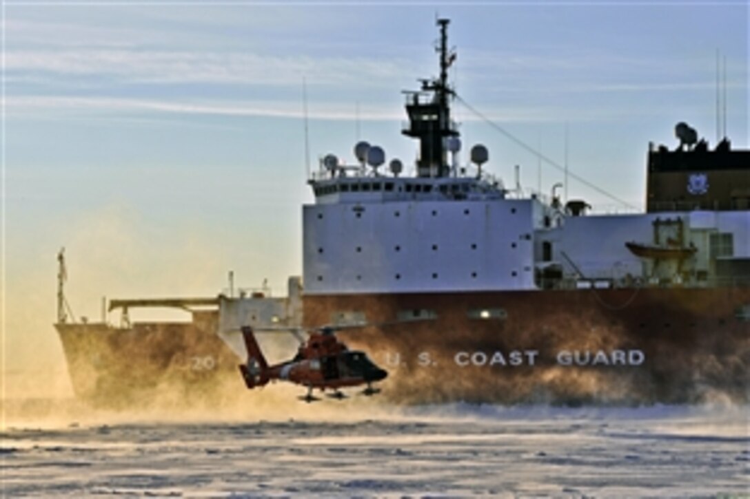 A U.S. Coast Guard MH-65 Dolphin helicopter lands on an ice sheet near Nome, Alaska, Jan. 18, 2012. The helicopter and crew traveled with the USCGC Healy as it escorted the Russian tanker Renda across the Bering Sea to deliver fuel to Nome, Alaska. 
