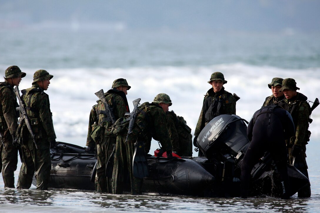Japanese Soldiers with the Western Army Infantry Regiment, Japanese Ground Self Defense Force conduct amphibious training at Naval Amphibious Base Coronado, Jan. 22. The JGSDF are here to participate in Exercise Iron Fist with the 15th Marine Expeditionary Unit, a unique training opportunity for both services. Boats are one of the many amphibious means the Marine Corps uses to move troops ashore in an expeditionary manner. Marine Expeditionary Units are responsible to our nation as a 911 force in readiness.