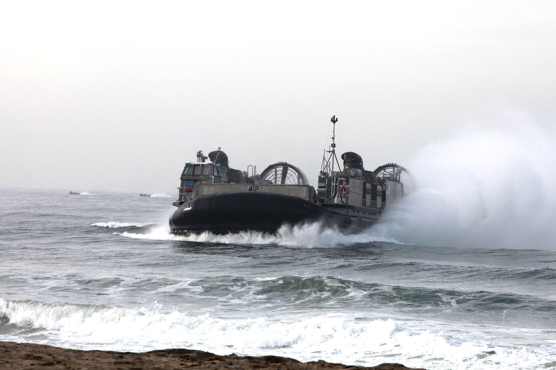 A Landing Craft Air Cushion comes ashore during a familiarization exercise aboard Camp Pendleton, Calif., Jan. 24. The event was part of Exercise Iron Fist 2012, a bilateral amphibious training exercise between U.S. Marines and the Japanese Ground Self Defense Force.