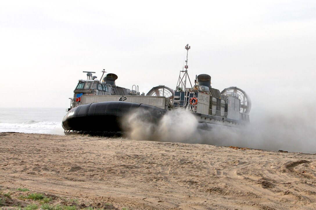 A Landing Craft Air Cushion comes ashore during a familiarization exercise aboard Camp Pendleton, Calif., Jan. 24. The event was part of Exercise Iron Fist 2012, a bilateral amphibious training exercise between U.S. Marines and the Japanese Ground Self Defense Force.