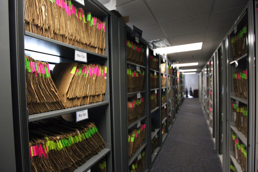 Service record books remain on the shelves in the SRB section, Installation Personnel Administration Center aboard Marine Corps Base Camp Lejeune after recently being scanned and digitalized. More than 38,000 SRBs were scanned during the conversion to an electronic record, which is now available on Marine Online.::r::::n::