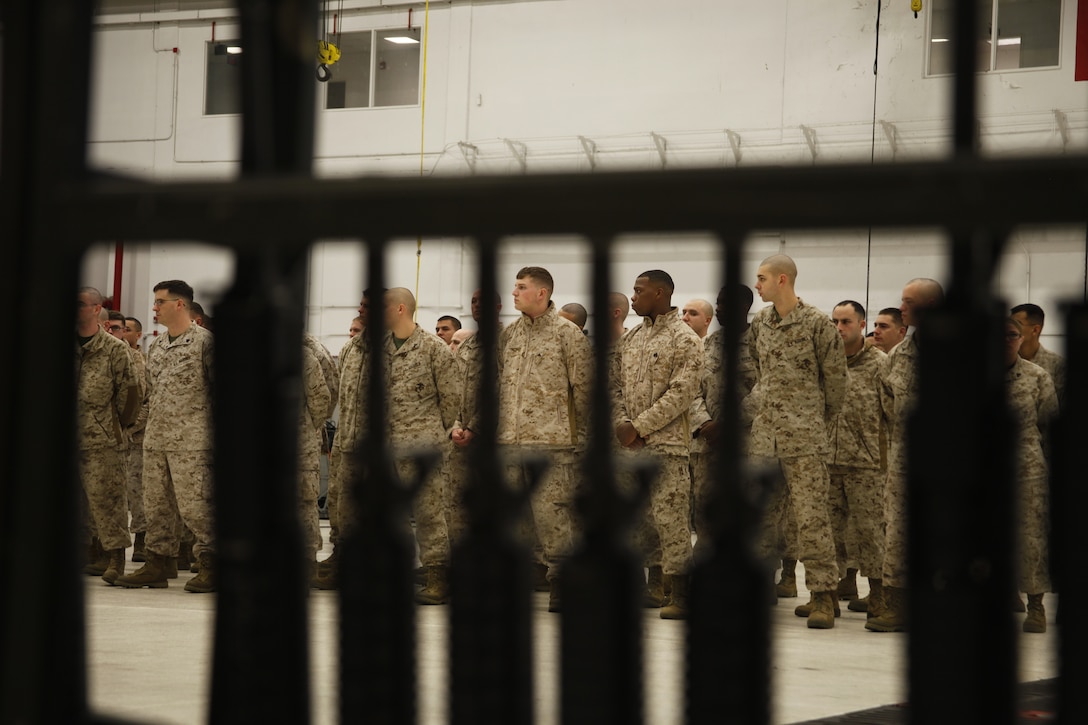 Marine Heavy Helicopter Squadron 366 Marines stand in an accountability formation held in their squadron's hangar Jan. 25, 2012, before being issued rifles and pistols. HMH-366 deployed to Afghanistan in support of Operation Enduring Freedom.