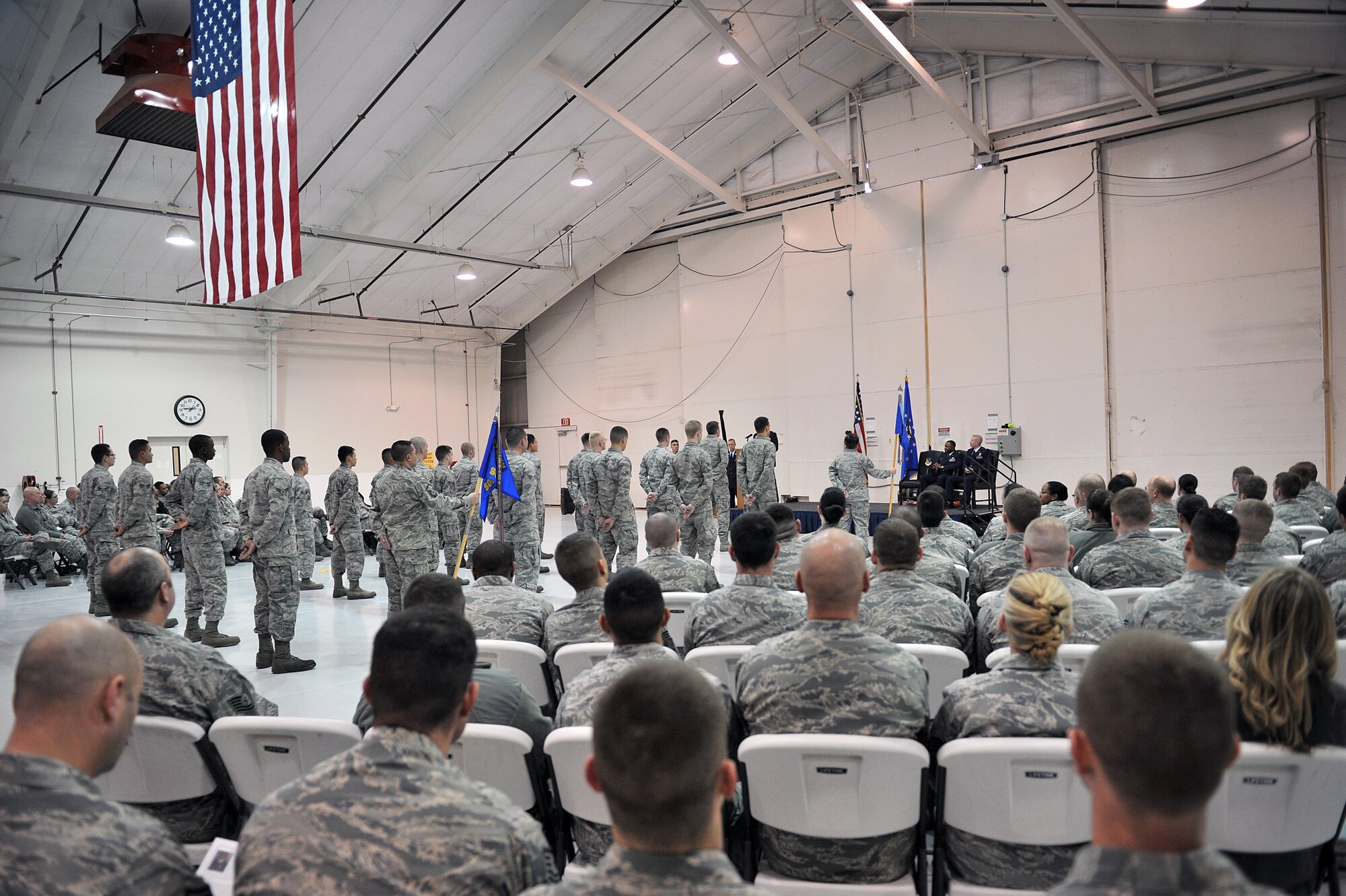 Audience members attend an official squadron reorganization ceremony which made Maj. Marcus Brazell the 727th Special Operations Aircraft Maintenance Squadron commander, and Maj. Bernabe Whitfield the 27th Special Operations Maintenance Squadron commander at Cannon Air Force Base, N.M., Jan. 24, 2012. (U.S. Air Force photo Tech. Sgt. Josef Cole)