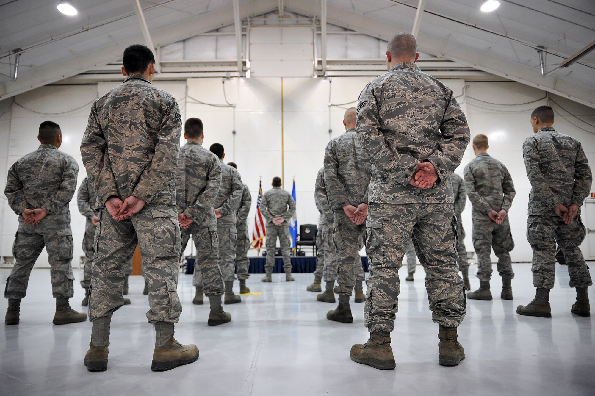 Airmen stand in formation at an official squadron reorganization ceremony during which Maj. Marcus Brazell the 727th Special Operations Aircraft Maintenance Squadron commander, and Maj. Bernabe Whitfield the 27th Special Operations Maintenance Squadron commander at Cannon Air Force Base, N.M., Jan. 24, 2012. (U.S. Air Force photo Tech. Sgt. Josef Cole)