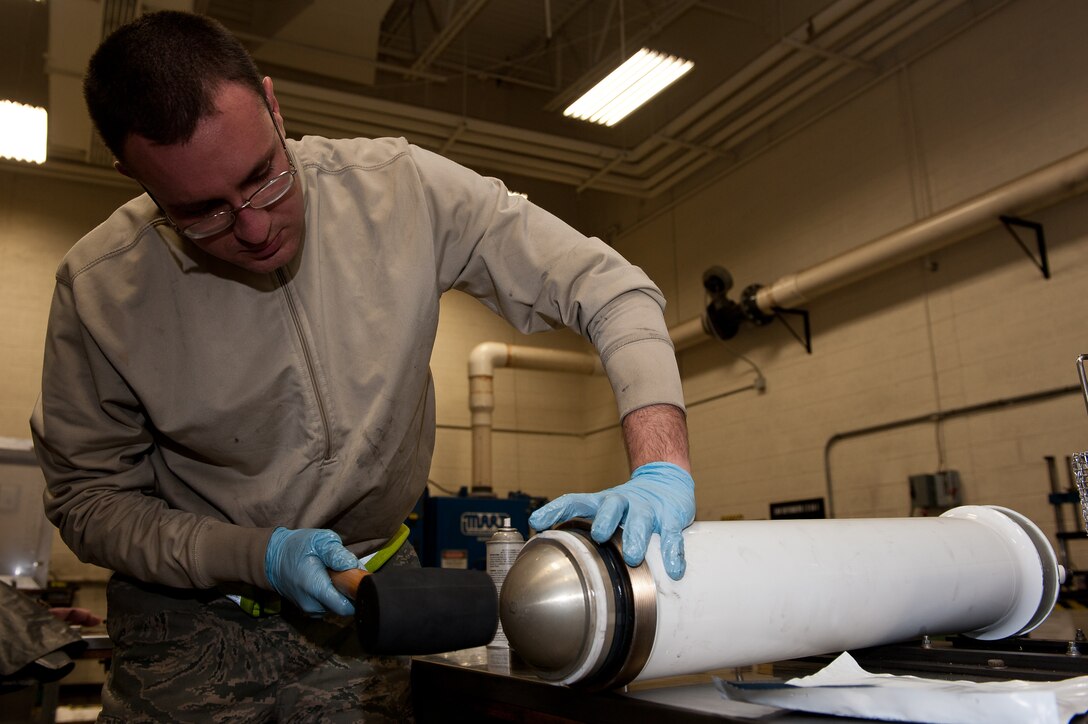 Senior Airman Michael Daniel, 28th Maintenance Squadron hydraulics journeyman, installs an auxiliary power unit piston in an APU in the 28th MXS Hydraulics Shop at Ellsworth Air Force Base, S.D., Jan. 19, 2012. Ellsworth maintainers build and maintain various hydraulic components that keep Ellsworth’s B-1B fleet mission ready. (U.S. Air Force Photo by Airman 1st Class Kate Thornton/Released)
