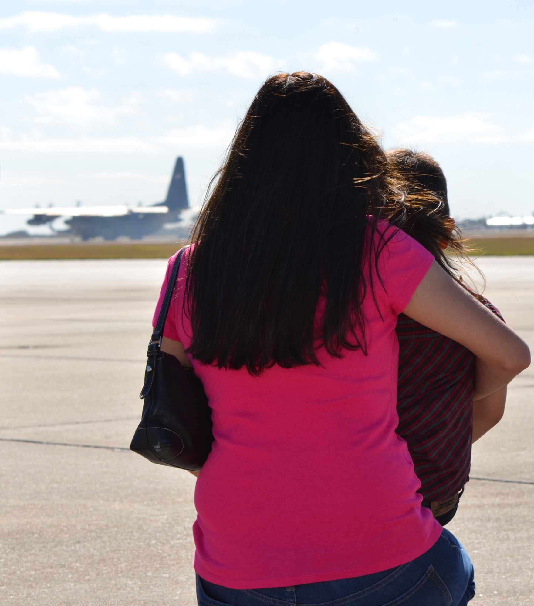 Friends and family of Airmen from the 920th Rescue Wing, Patrick Air Force Base, Fla., said goodbye to their loved ones Jan. 25 as they took off in wing HC-130P/N King aircraft headed for the Horn of Africa. Approximately, 60 Rescue Wing Airmen will be part of the Combined Joint Task Force - Horn of Africa to offer their rescue might for the next four months. (U.S. Air Force photo/Capt. Cathleen Snow)