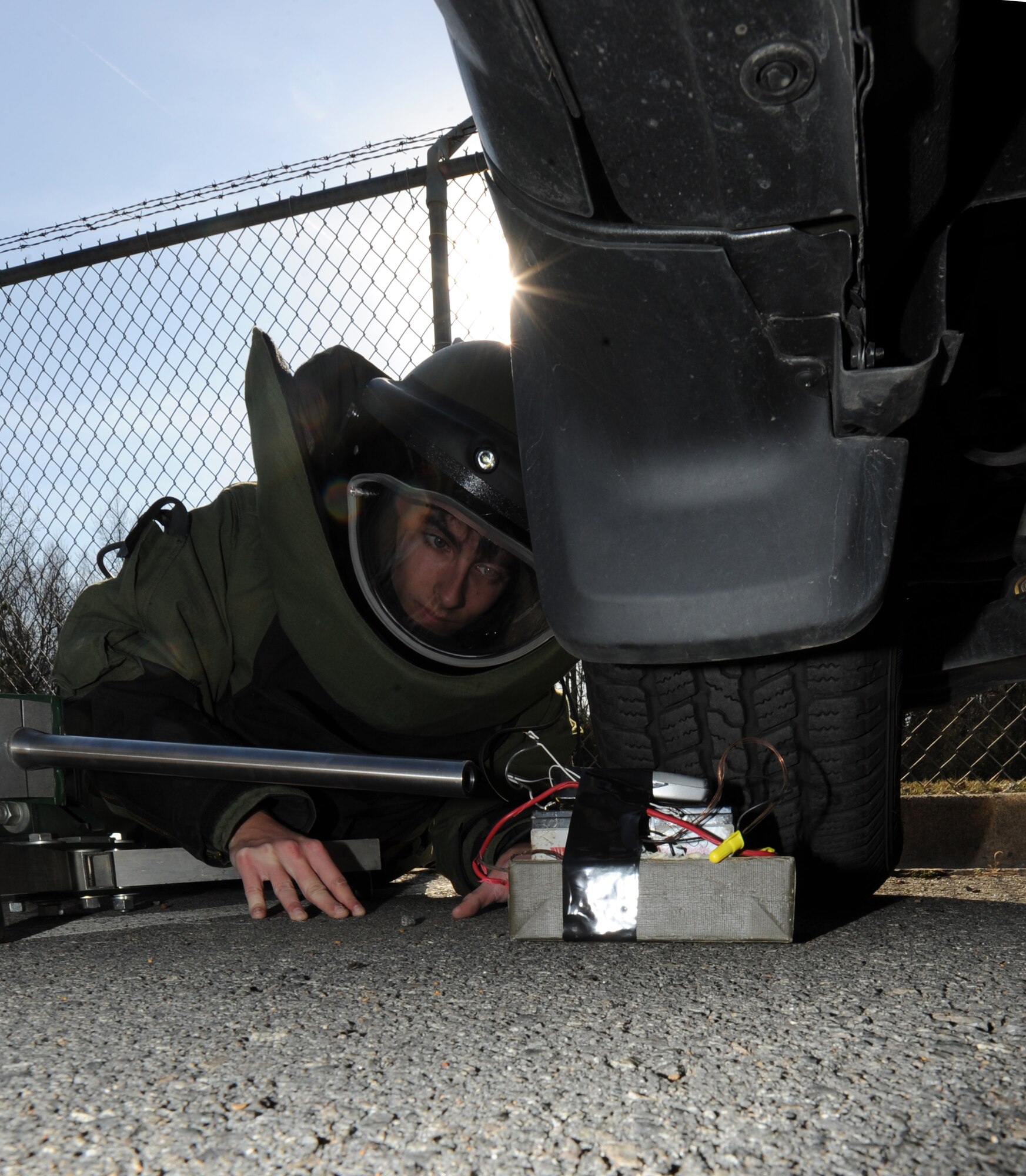 Airman 1st Class Joseph Makey, a 19th Civil Engineer Squadron Explosive Ordnance Disposal apprentice, utilizes the pan disruptor to disarm an Improvised Explosive Device, Jan. 19, 2012, at Little Rock Air Force Base, Ark. The 19th CES EOD conducted 328 EOD combat missions during 2010-2011, interrogating, rendering safe and disposing of more than 700 I.E.D.’s. (U.S. Air Force Photo by Airman 1st Class Rusty Frank)