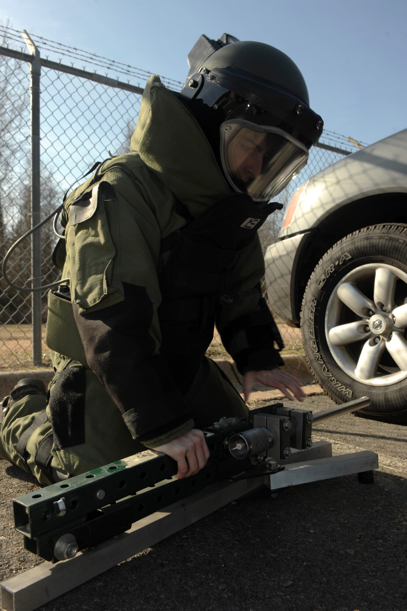 Airman 1st Class Joseph Makey, a 19th Civil Engineering explosive ordnance disposal apprentice, prepares a pan disruptor, Jan. 19, 2012, at Little Rock Air Force Base, Ark. The pan disruptor disarms an Improvised Explosive Device. (U.S. Air Force Photo by Airman 1st Class Rusty Frank)